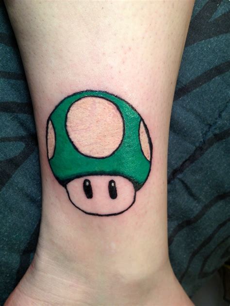 Una vida, así de simple. This is the 1UP mushroom from Super Mario Bros! | Tattoos ...