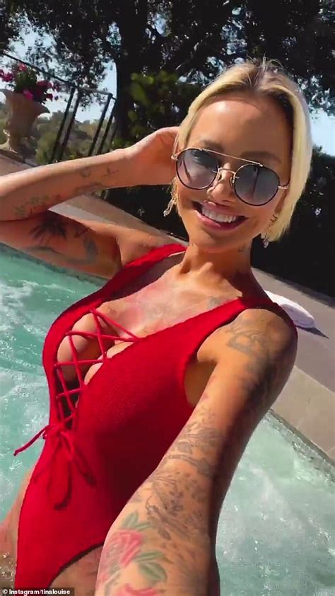 Selling Sunset Tina Louise Flaunts Her Ample Assets In A Plunging Swimsuit Daily Mail Online