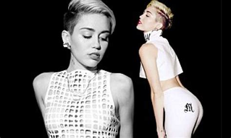 Miley Cyrus Displays Her Breasts In Mesh And Her Derriere In Pvc For