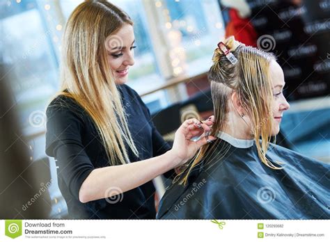 Barber Or Stylist At Work Hairdresser Cutting Woman Hair