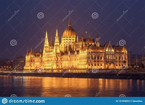 Hungarian Parliament Building On The Bank Of The Danube In Budapest At
