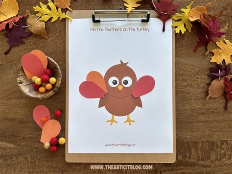 Pin The Feathers On The Turkey Fun Thanksgiving Game Free Printable The Art Kit