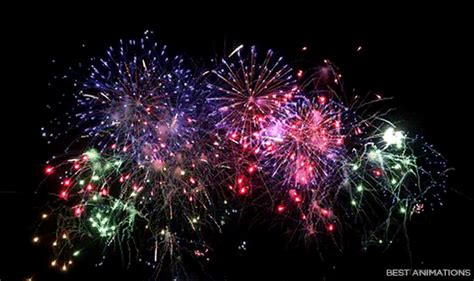 Fireworks Are Lit Up In The Night Sky With Bright Colors And Sparkles
