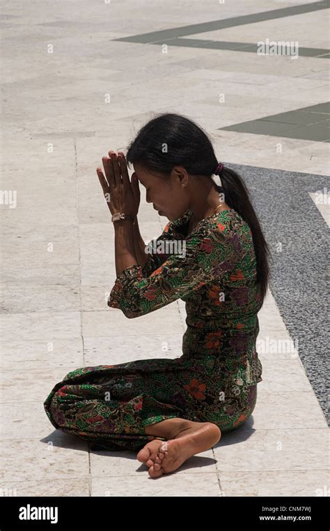 Buddhist Burmese Woman Praying At Shwedagon Pagoda Rangoon Burma