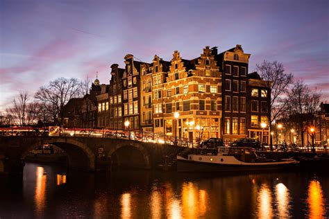 Amsterdam Canal Houses At Dusk Wyse Travel Confederation