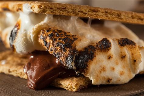 Heat the marshmallow over an open flame until it begins to brown and melt. Favorite S'mores Recipes - Hugs and Cookies XOXO