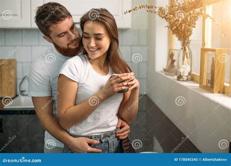 Happy Caucasian Couple In The Kitchen At Morning Stock Image Image Of Kitchen Home 178045345