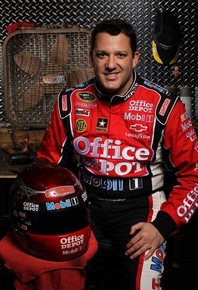 Nascar means standing in the back of a ram with family and watching cars come at you at 170 mph. Tony Stewart Photos Photos: 2012 NASCAR Media Day ...