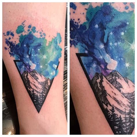 Watercolor tattoo helps to express emotions, love, beliefs etc. Watercolor Mountain and Sky tattoo by Leah Kramer | Eye ...