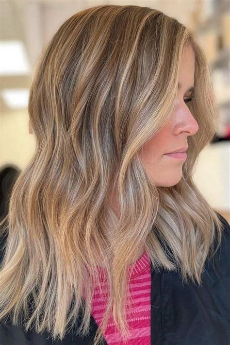 trendy blonde hair colors and several style ideas to try in 2023 dark blonde hair color