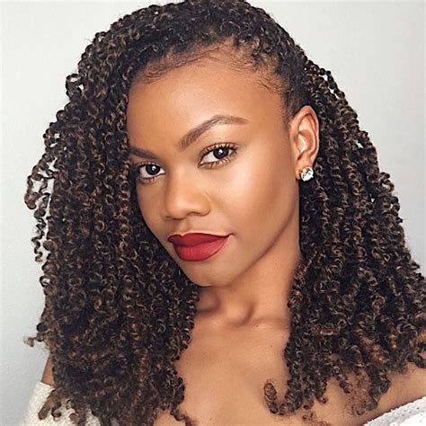 The shrinkage of this hairstyle shows that it was done on damp hair. How to Spring Twist on Natural Hair | NaturallyCurly.com