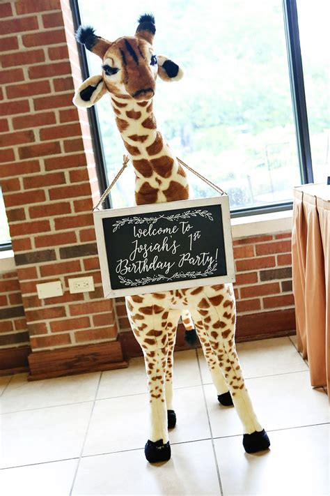 No need to spend a bunch of money on decorations! Whimsical Gold Safari First Birthday Party // Hostess with ...