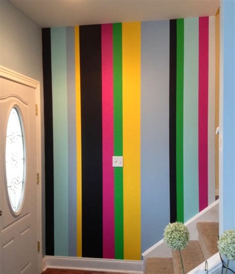 Painting Multi Colored Stripes On A Wall For An Entrance To Impress
