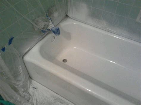 Surface renew fiberglass bathtubs and showers. After a second coat of Renew, tub and tile resurfacer ...