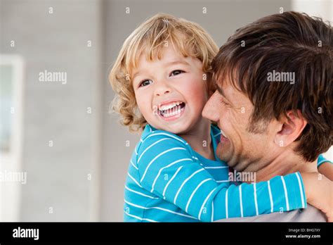 Son And Father Hugging Stock Photo Alamy
