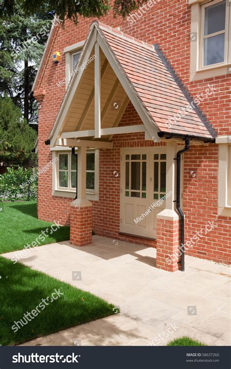 This article shows with an example the design of a. Contemporary Home With Large Pitched Roof Canopy Above The ...