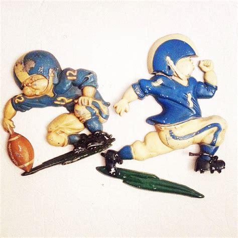 Metal wall art offers rich hues and textures in limitless forms. Metal HOMCO FOOTBALL PLAYER Wall Ornament. Sports Themed Art. Man Cave . Vintage Cast Metal Iron ...