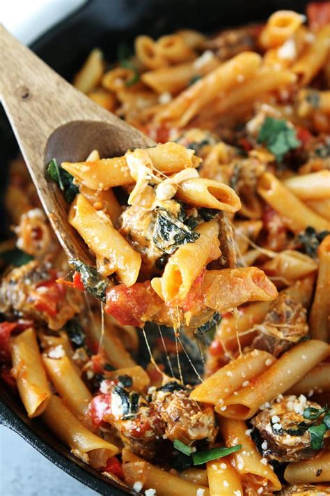 One pot meals are the best for busy families like mine because they are simple, come together in a flash and require how to make one pot cheesy smoked sausage pasta. One Pot Sausage Pasta Recipe | Two Peas & Their Pod