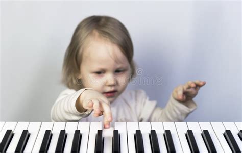 Little Girl Learning To Play The Piano Stock Photo Image Of Perform