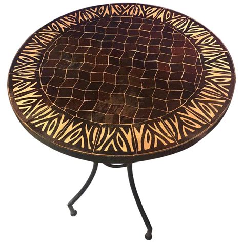 This art deco is fungal resistant, and that makes them last for a very long time. Moroccan Mosaic Brown Tile Bistro Table | Chairish