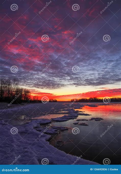 Beautiful Winter Landscape With Frozen Lake And Sunset Stock Photo