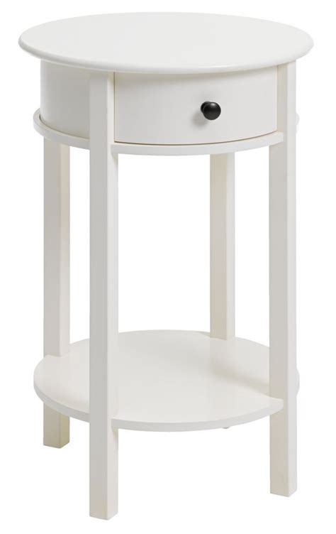Its round base is echoed in a glowing ring shade with an acrylic diffuser that ensures soft illumination over a side table or nightstand. Small Round Nightstand - Home Designing