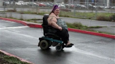 sinfully divine ssbbw over 600 pounds rolling around the parking lot in a wheelchair 600 pound