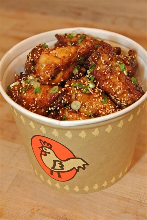There are 190 calories in 4 wings (100 g) of costco chicken wings. chicken wings - Oxbow Public Market