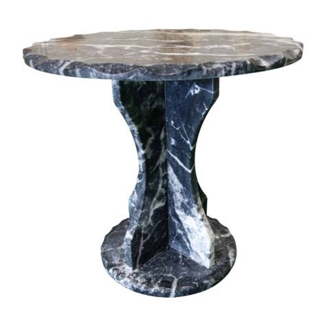 Coffee table with stone top a bud also luxurious designer, source: Black Veined Marble Round Coffee Table | Pisa Stone