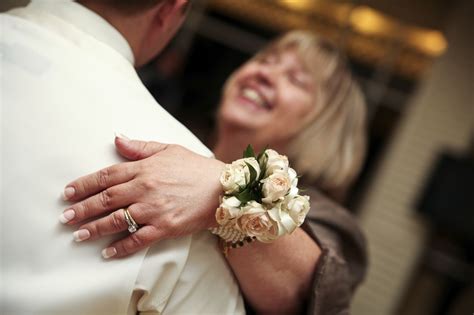 Mother of the groom and i carried a mini version of the bridesmaids bouquets. Wrist corsage for the mothers of the bride and groom ...