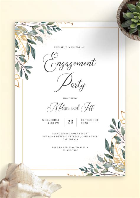 An Elegant Engagement Party With Greenery And Gold Foil On The Front In White Paper
