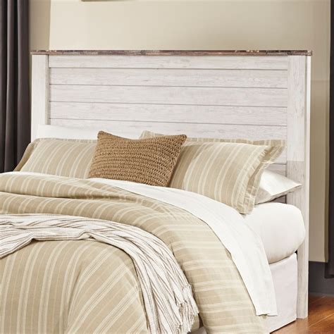 Crisp, linear profile contrasted with a bonnet top framed headboard really brings the look home. Ashley Furniture Willowton Queen Full Panel Headboard in ...
