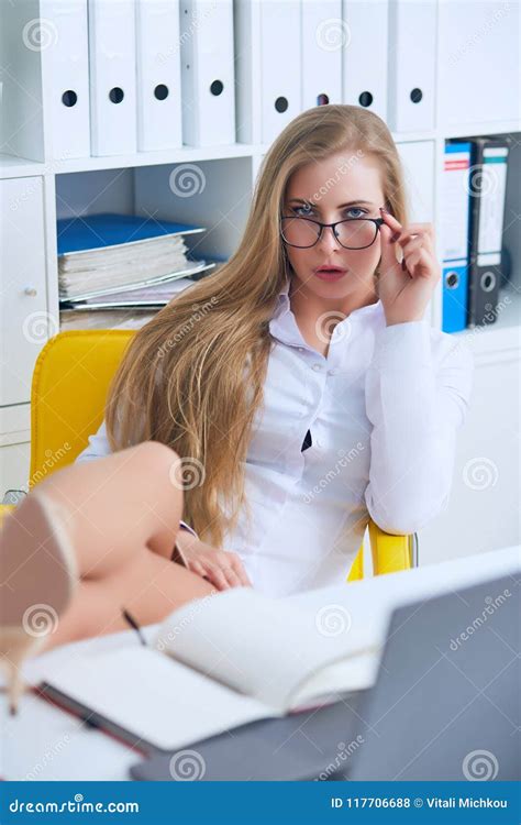 Office Flirt Attractive Woman Flirting Over Desk With Her Coworker Or