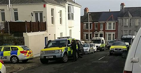Two females and two males. Ambulance and ten police units at incident in Plymouth ...