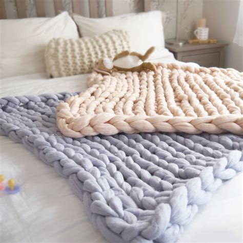 This just makes a nice little, a little lap quilt. chunky knit blanket merino wool tops roving yarn arm ...