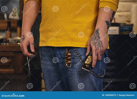 Stylish Barber Man With Hairdressing Tools In His Hands Prepare For