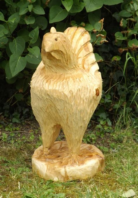 A Chainsaw Carved Chicken Carving Wood Carving Garden Sculpture