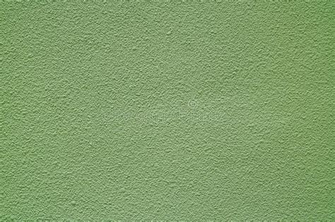 Light Olive Green Colored Rough Concrete Wall Front View For