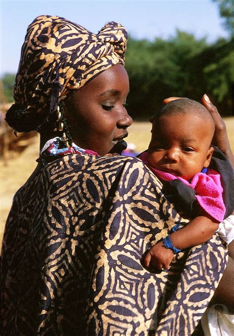 Portrait Of An African Mother Holding Her New Baby Mali African