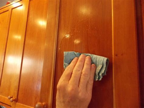 For this teak cleaner recipe or to use it on your kitchen or laundry room cabinets, mix the vinegar and salt to form a paste, and apply it to stains. How To Clean Wood Kitchen Cabinets - Citchen