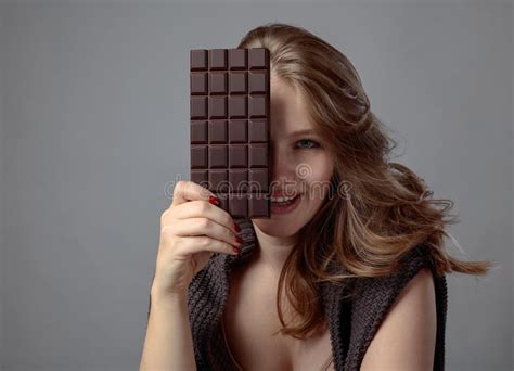 Happy Young Beautiful Woman Eating Chocolate Stock Image Image Of Hand Girl 137829693