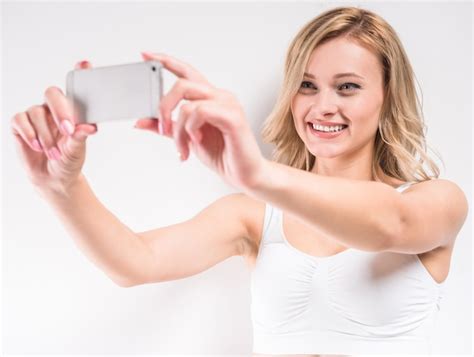 Premium Photo Beautiful Woman In White Cotton Underwear Taking Selfie