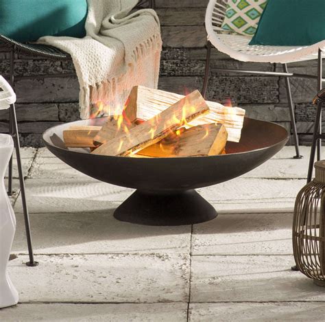 The 30 outdoor round wood burning fire pit with concrete baseweighs 44.2 lbs. Howland Cast Iron Wood Burning Fire Pit