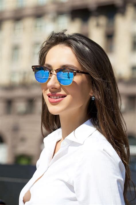 business woman with blue mirrored sunglasses