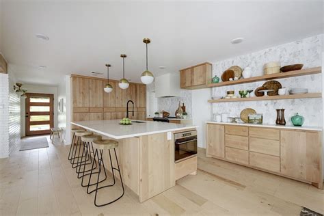 Open Kitchen With Flat Front Natural Alder Wood Cabinets Light Wood