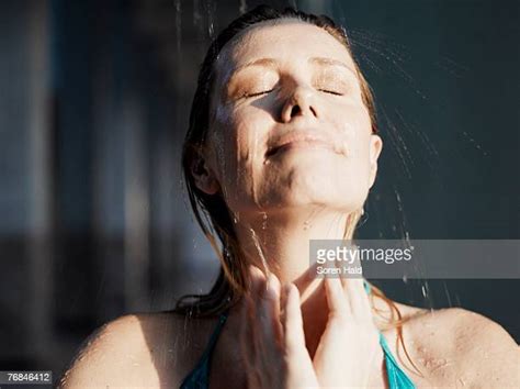 Woman Showering Bathroom Photos And Premium High Res Pictures Getty