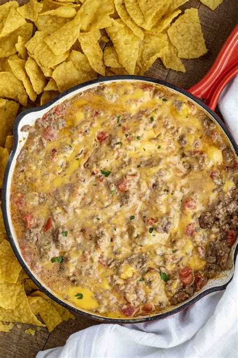 My son is a very picky eater, but loves velveeta cheese. Cheesy Beef Rotel Dip - Dinner, then Dessert