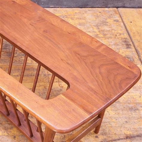 The unit also comes with bronze finished ferrules and its compact design makes it a catch for small living rooms. Monumental Cabin Modern Mid-Century Magazine Rack Walnut ...