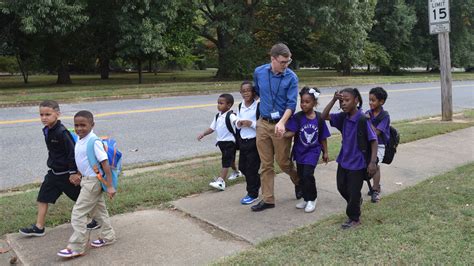 Heartwarming Photo Shows Teachers Walking Elementary School Students