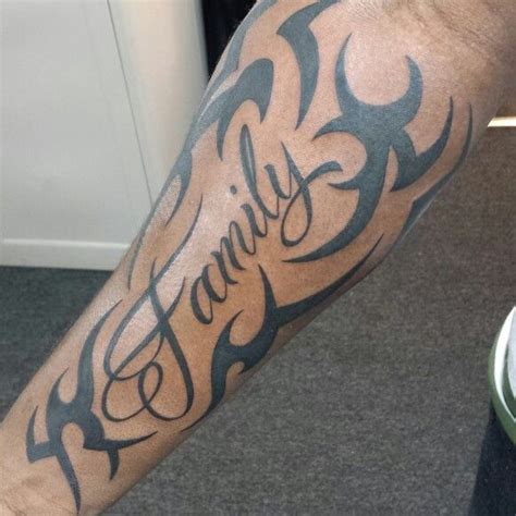 From noting social status and religious beliefs, the tribal tattoo became individual artistic expressions. Tribal Lettering Tattoo (With images) | Tribal arm tattoos ...